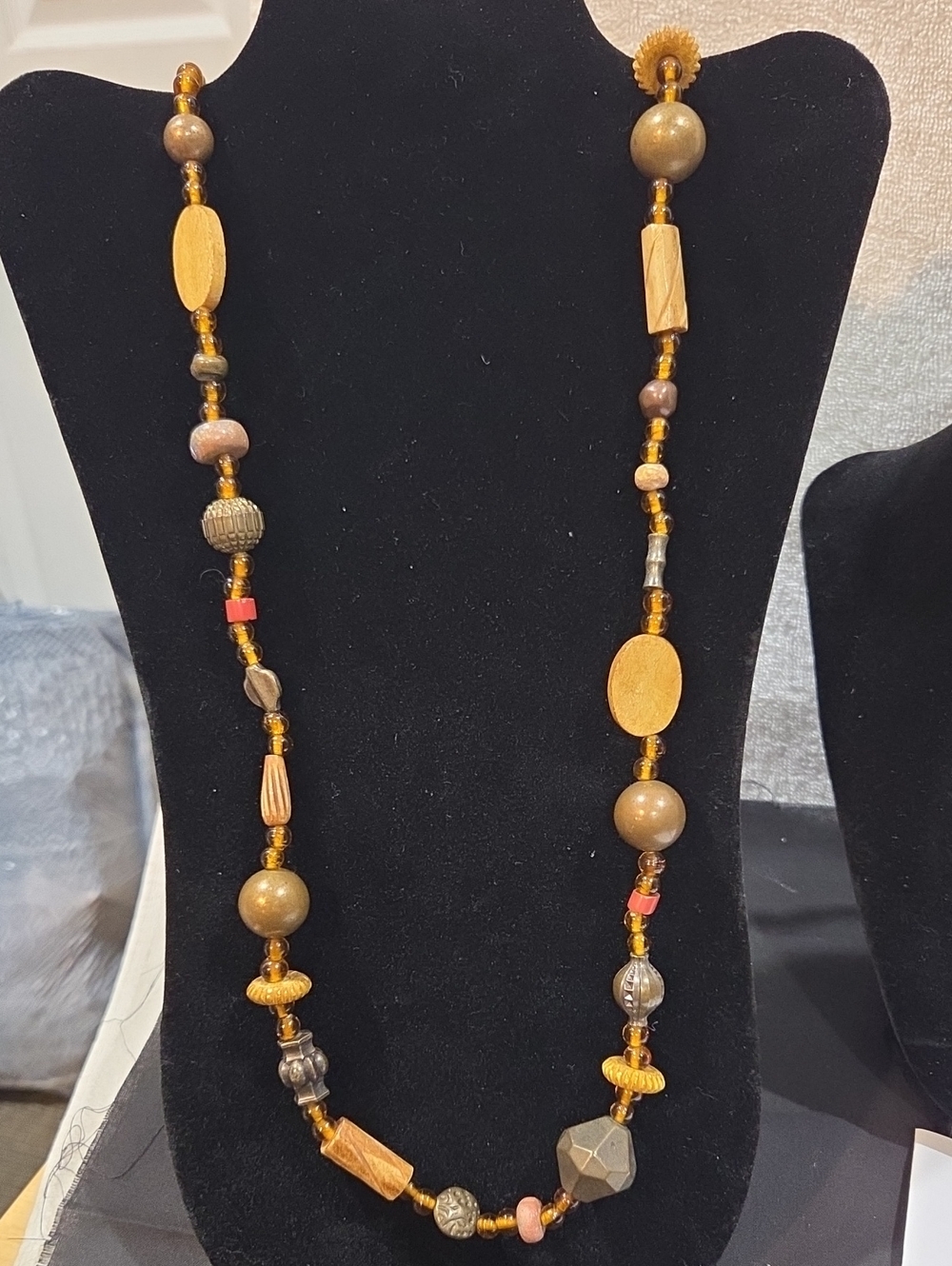 BOHO NECKLACE WITH WOODEN. METALLIC AND AMBERTONE BEADS